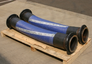 Click to enlarge - Multi plies of heavy duty polypropylene fabric and film are used to create a large bore hose for transfer of hydrocarbons, yet, still very flexible. Stainless steel inner and outer helical wire. 